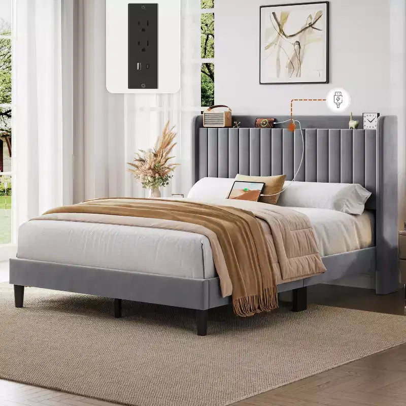 Estructura de cama tapizada con tomas de carga y puertos USB