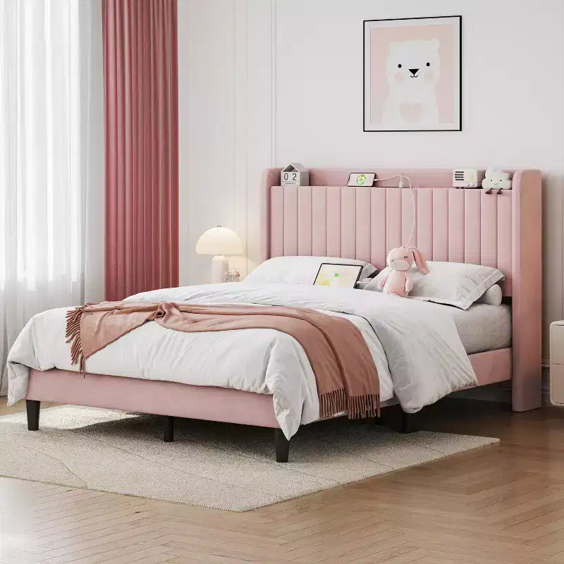Estructura de cama tapizada con tomas de carga y puertos USB