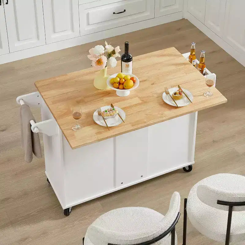 Isla de cocina móvil con encimera abatible, armario de almacenamiento y estante torre - carrito móvil con ruedas y puerta estilo granero, blanco